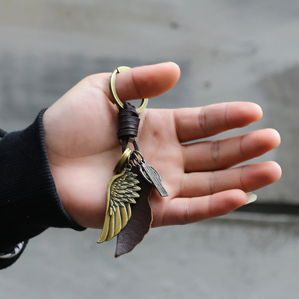 Fashion simple creative alloy wings key chain cross-border supply jewelry handmade leather factory direct wholesale