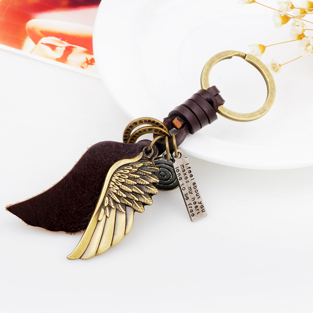 Fashion simple creative alloy wings key chain cross-border supply jewelry handmade leather factory direct wholesale