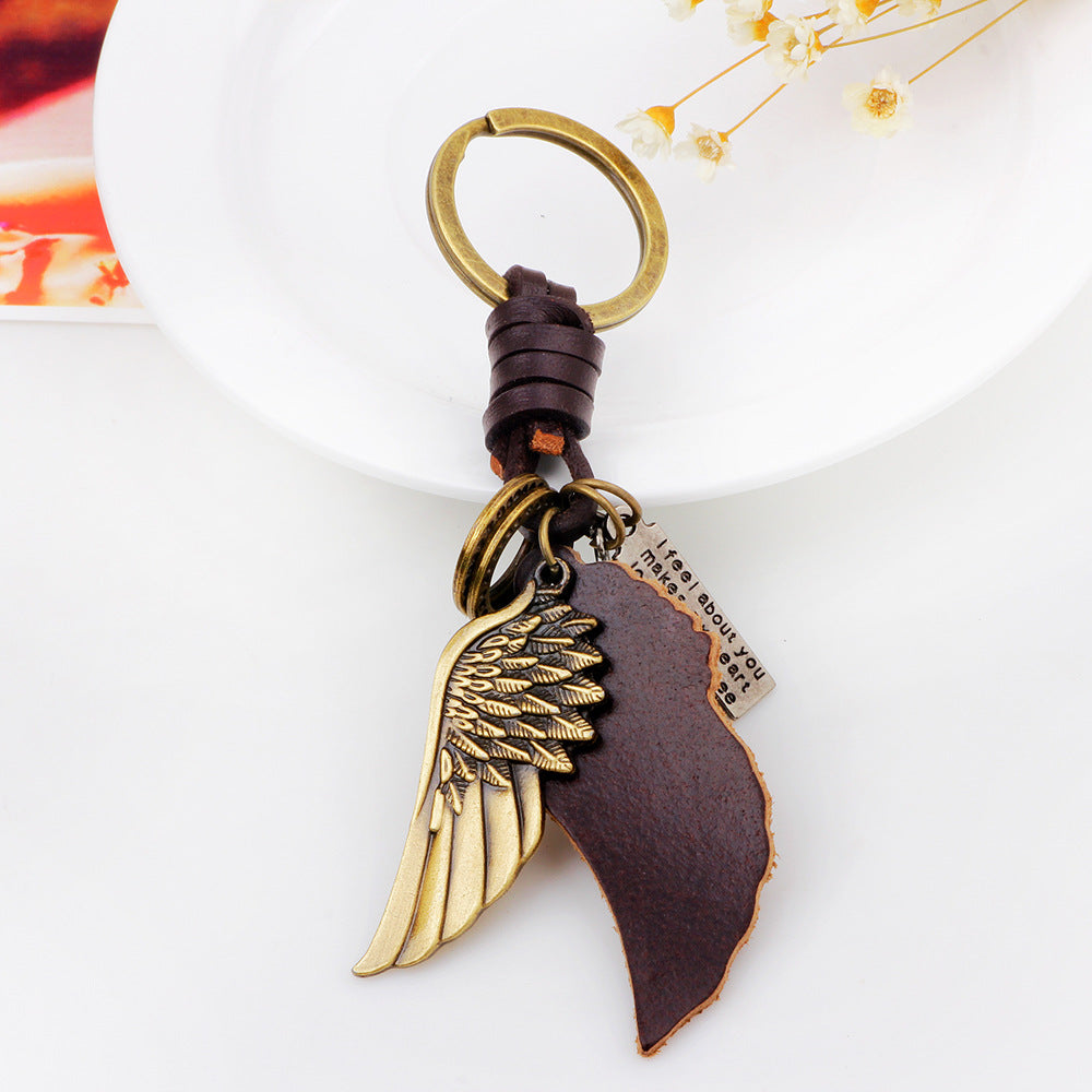 Fashion simple creative alloy wings key chain cross-border supply jewelry handmade leather factory direct wholesale