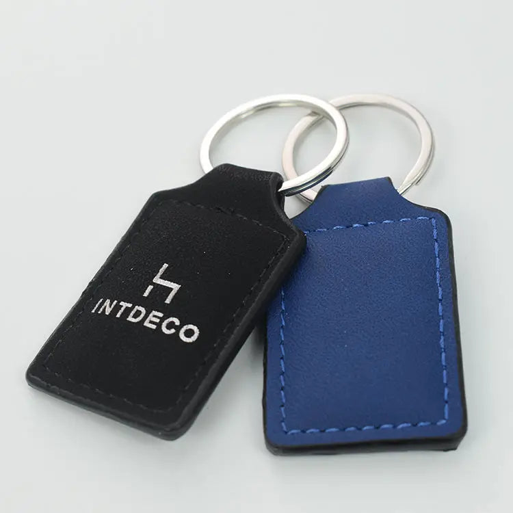 Wholesale Custom Embossing Printed Light PU Leather Rectangular Letter Keychains Simple Feature Creative Keyring Promotional