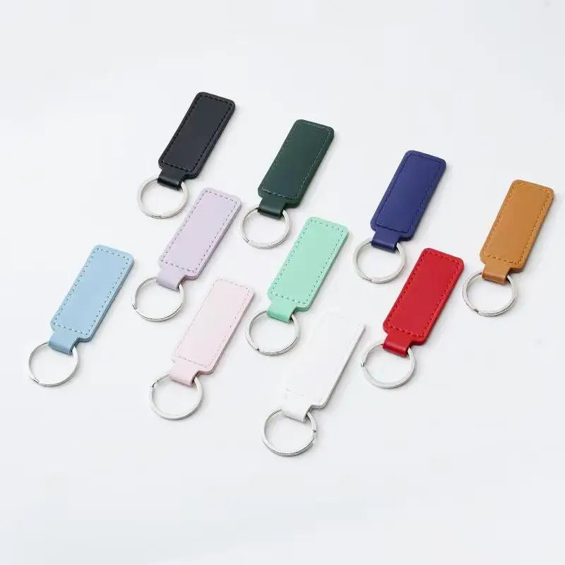 Wholesale Custom Embossing Printed Light PU Leather Rectangular Letter Keychains Simple Feature Creative Keyring Promotional