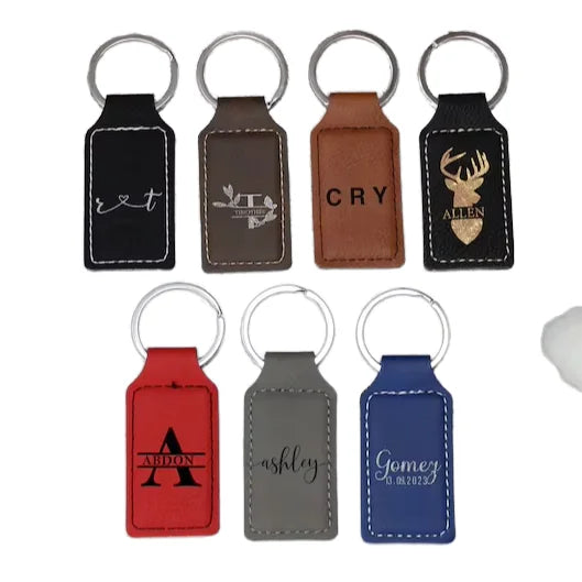 Wholesale Custom Embossing Printed Light PU Leather Rectangular Letter Keychains Simple Feature Creative Keyring Promotional