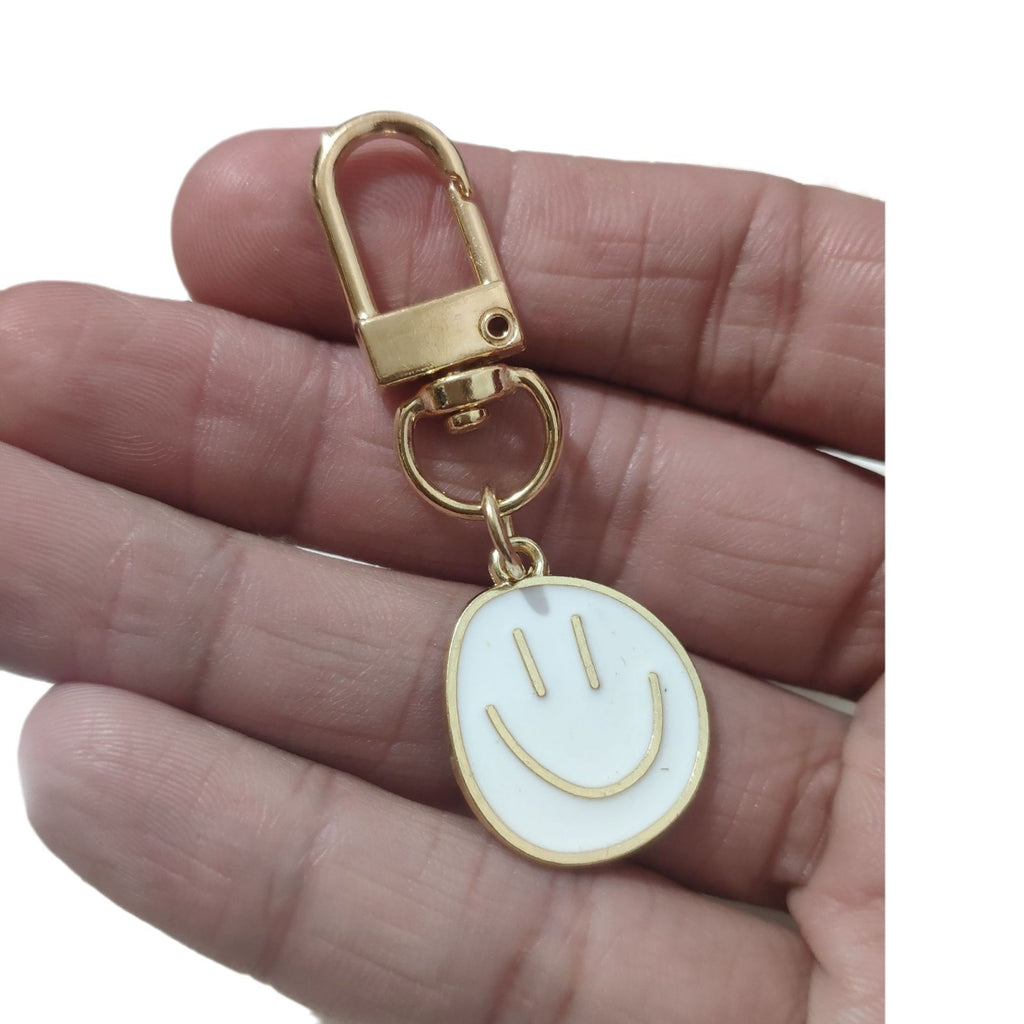 Cross-border e-commerce alloy color dripping smiley face keychain electroplated gold irregular expression bag pendant accessories