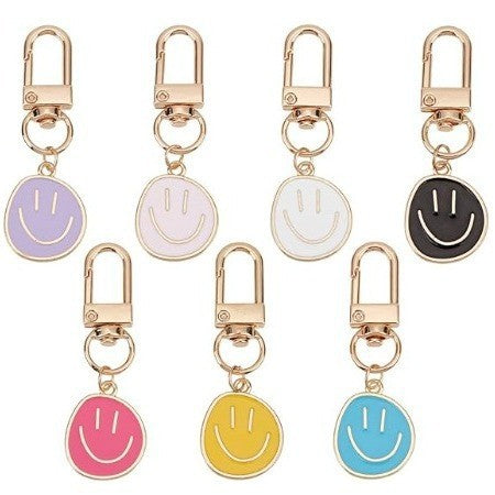 Cross-border e-commerce alloy color dripping smiley face keychain electroplated gold irregular expression bag pendant accessories